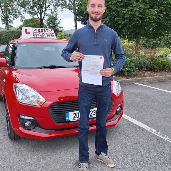 iamge of a student after passing his driving test